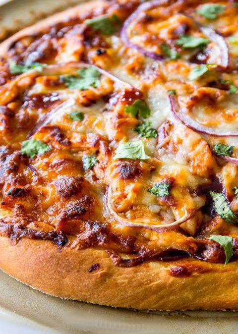 An image of a buffalo wing Pizza it looks delicious 